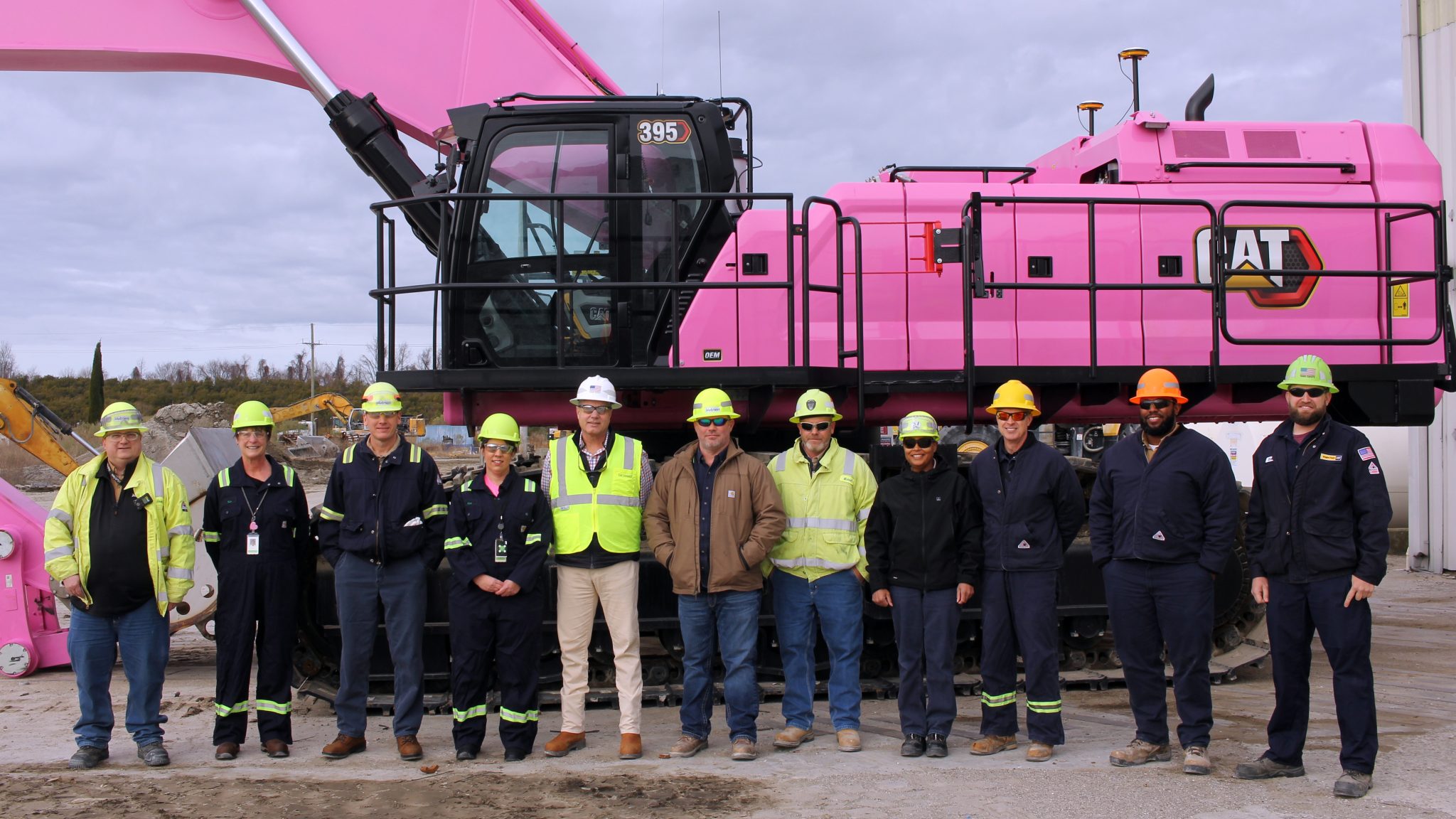 Gregory Poole Paints Excavator Pink for Breast Cancer